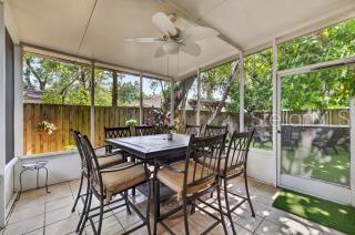 OUTSIDE SCREENED IN PATIO-OFF OF KITCHEN AREA