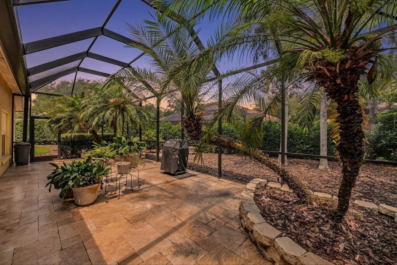 Stunning addition with a Covered and Screened 16x36 Patio with Pavers.