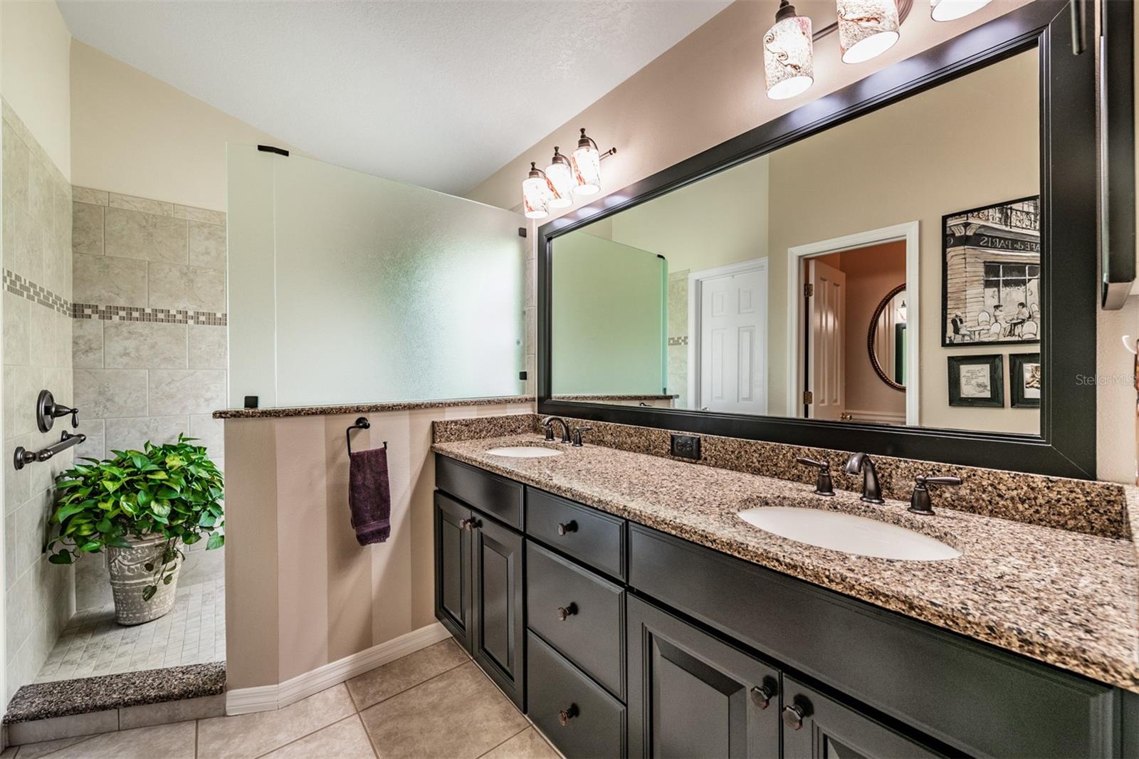 Updated Master Bathroom, Walk in shower, Double Vanities, Tile Flooring.