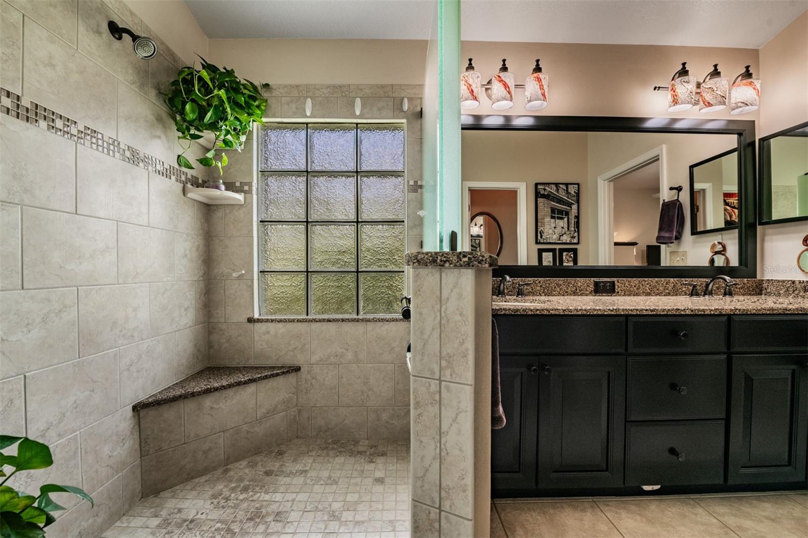 Updated Master Bathroom, Walk in shower, Double Vanities, Tile Flooring.