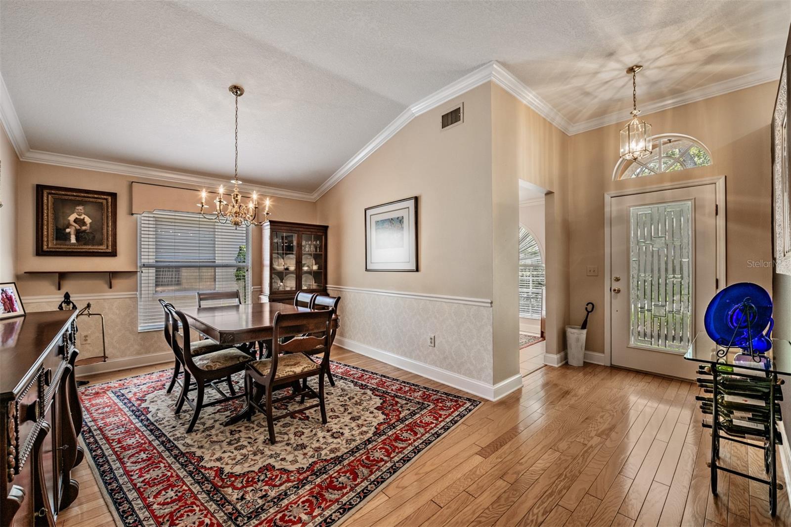 Front entry, Hardwood Flooring, crown molding, Large dining room area (office just off the front door)
