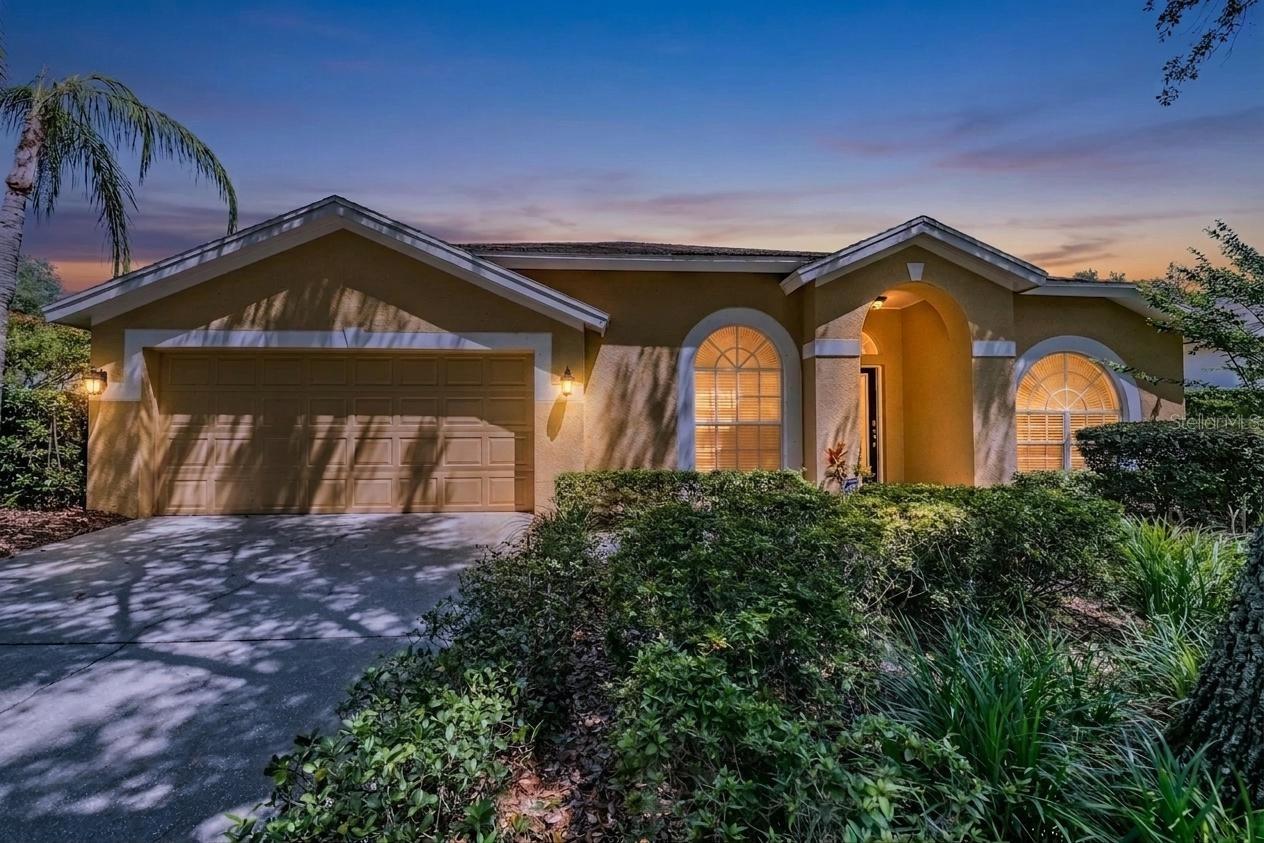 Front Exterior, Office, 3 Bedrooms, 2 bathrooms, 2 car garage, large screened and covered Patio addition with pavers.