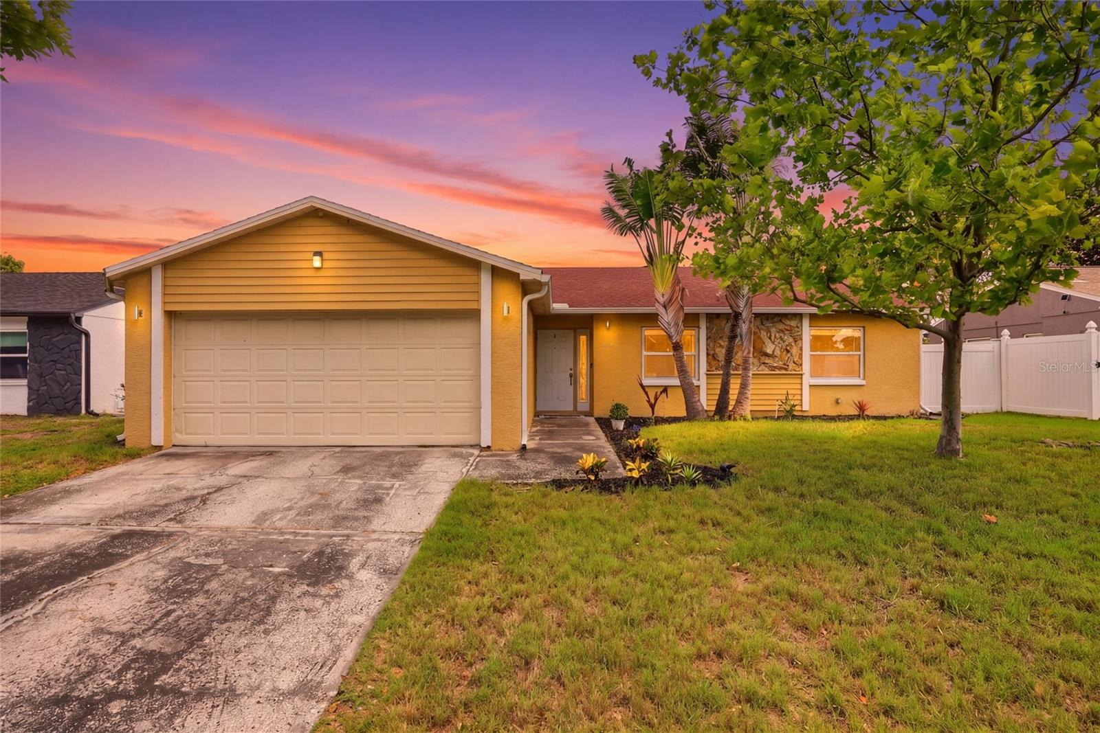 Welcom home to your centrally located updated home with a fully fenced large backyard!