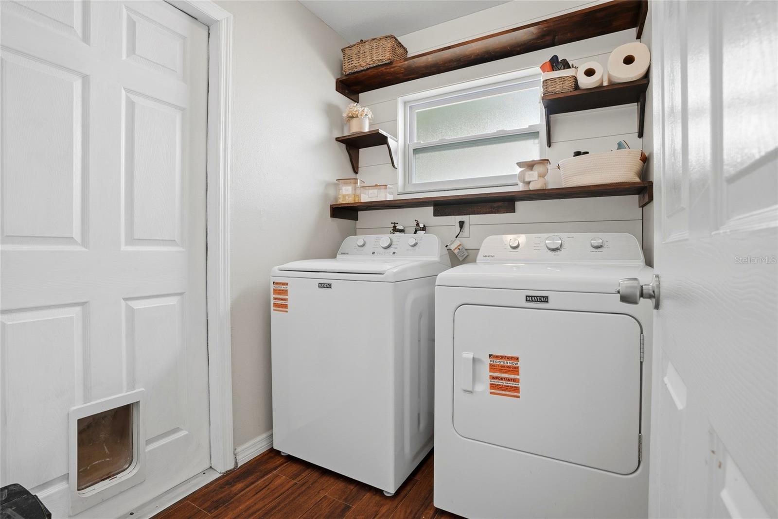 Inside laundry with built in shelving