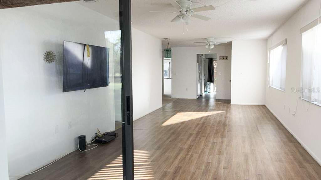 From back porch to living room dining room combo