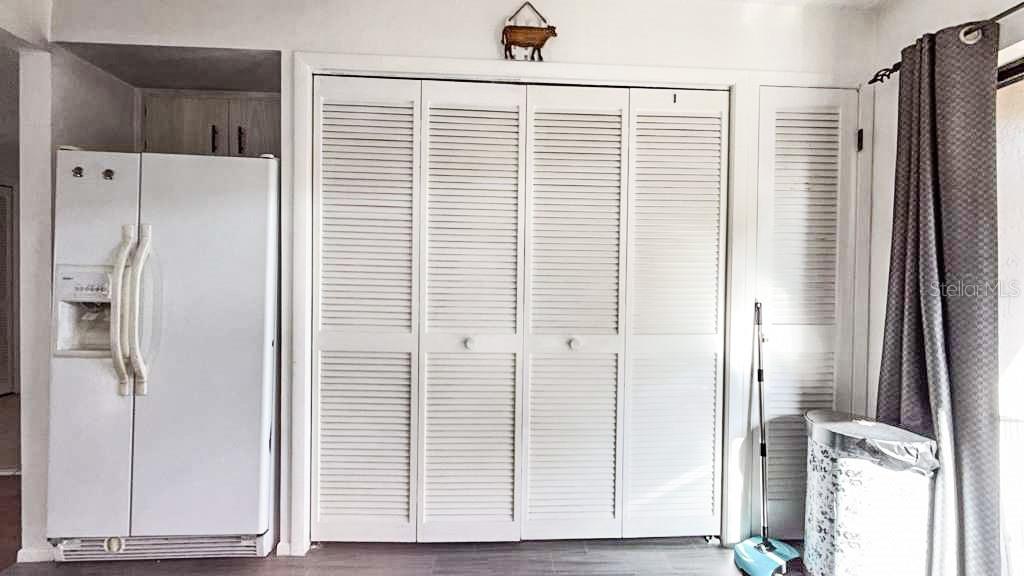 Refrigerator, washer/dryer, hot water heater, water filtration system and overflow pantry.