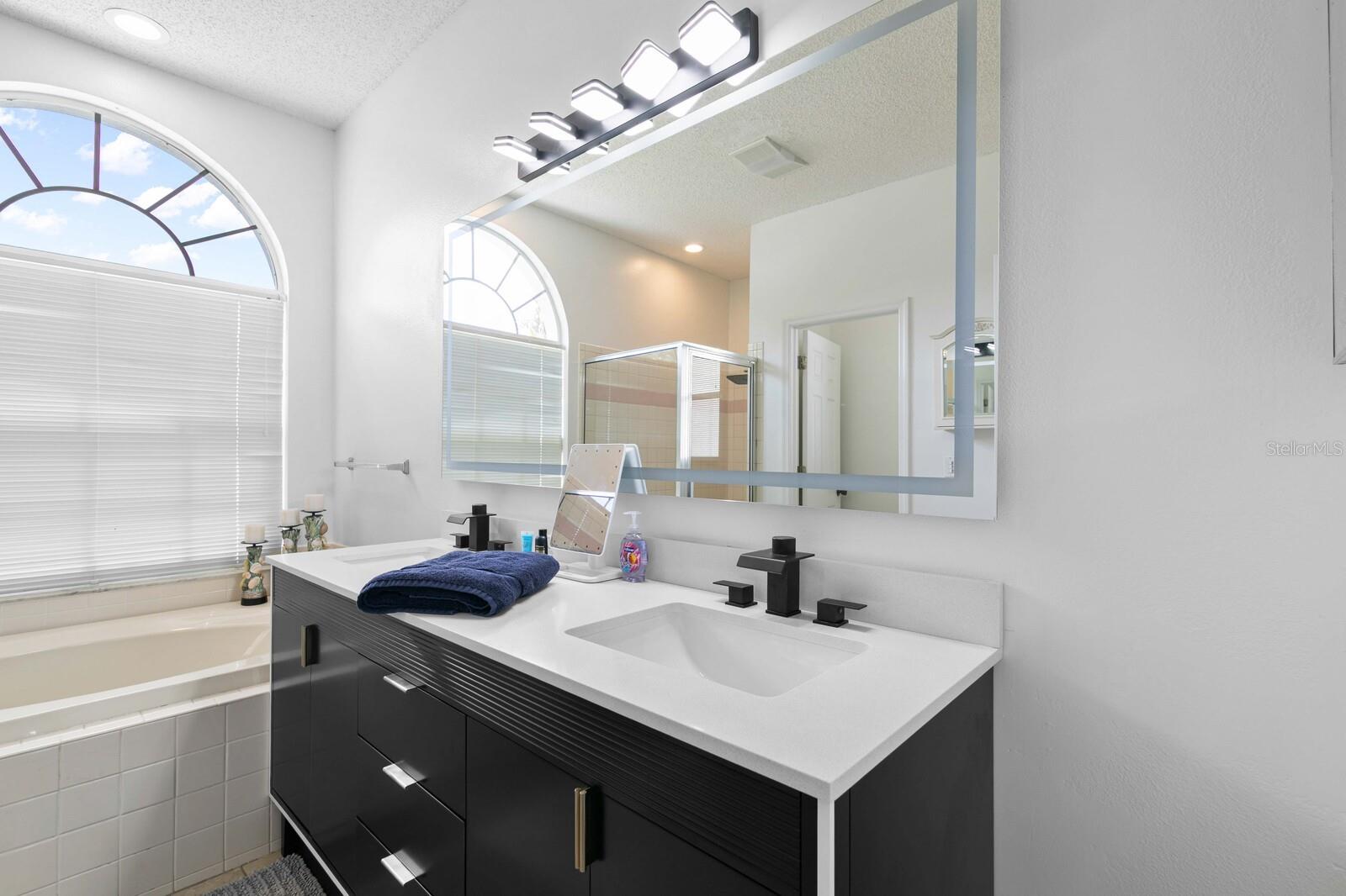 Upgraded Primary Bath With Quartz Tops & New Cabs
