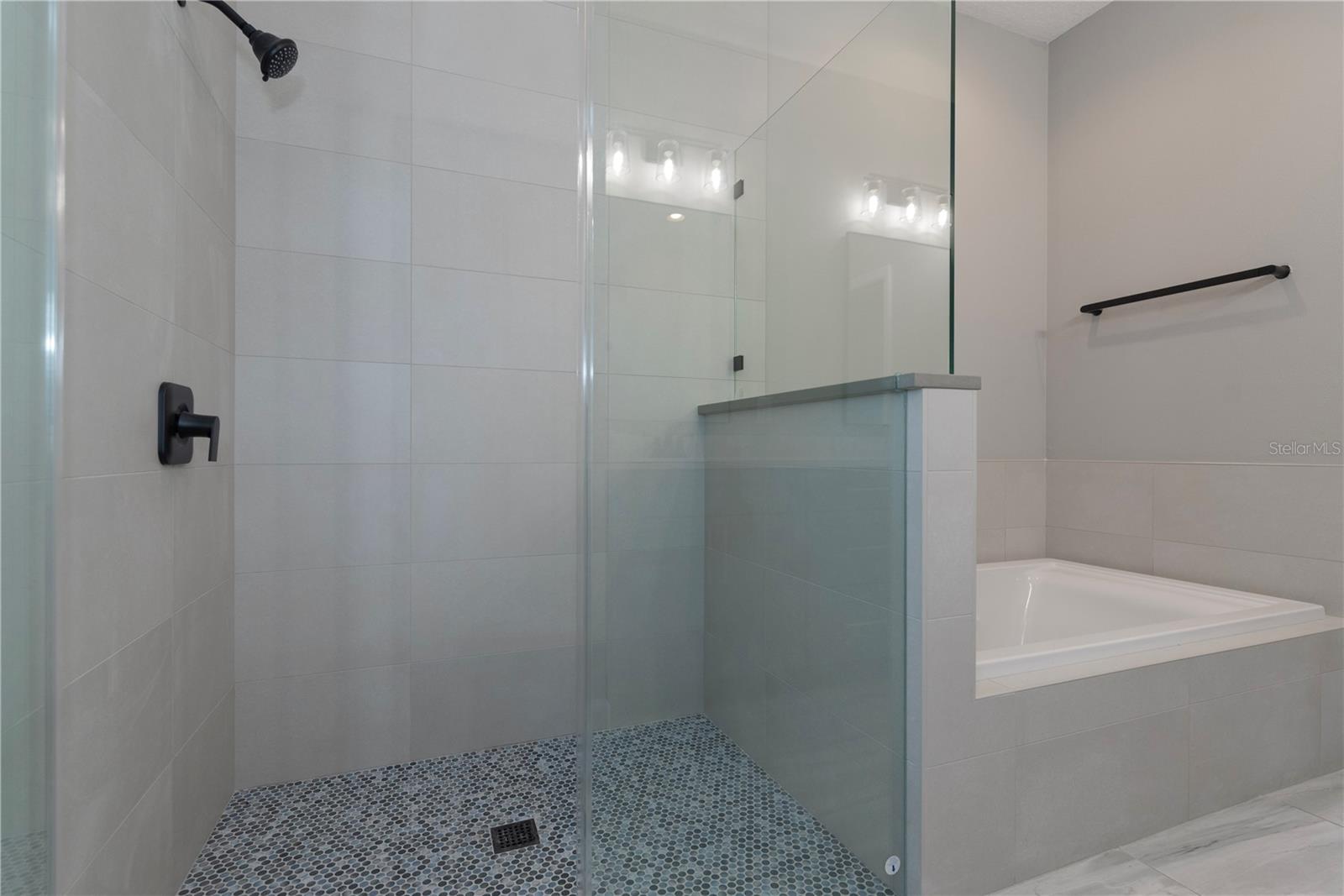Primary bathroom updated in 2026.
