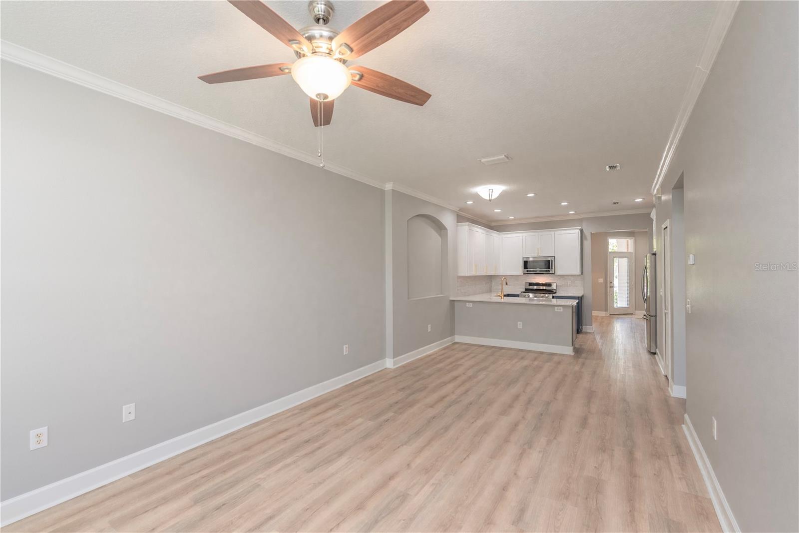 Family room looking into kitchen.