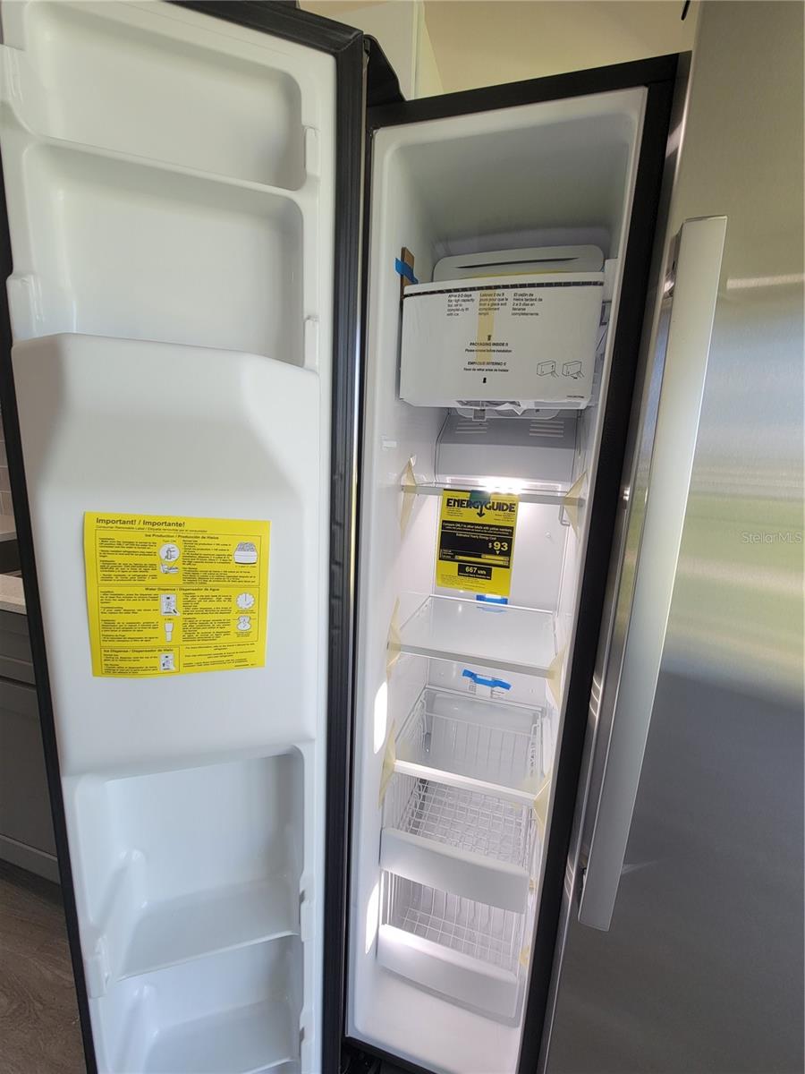 New GE side-by-side refrigerator with ice maker