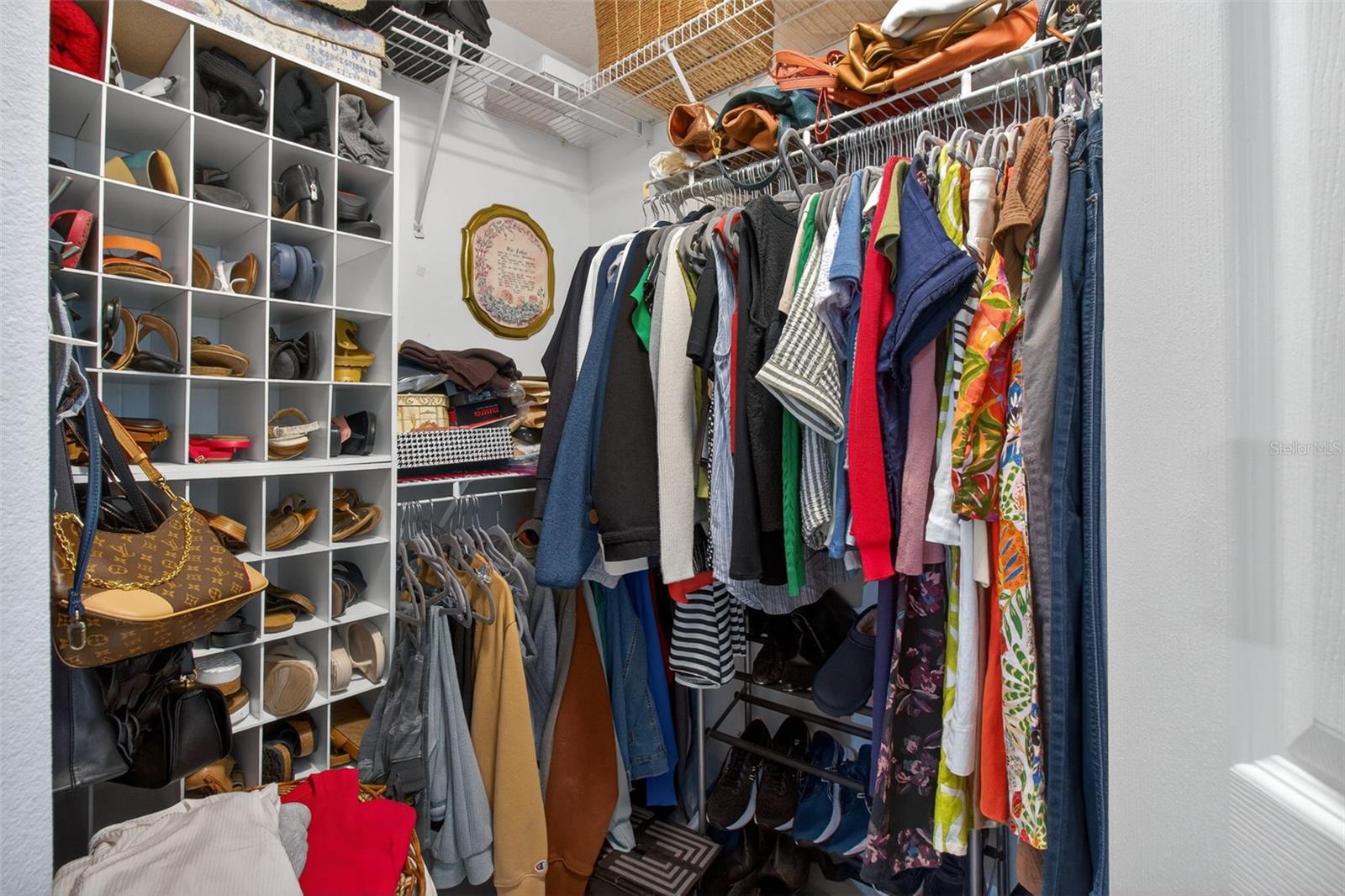 PRIMARY ROOM WALK-IN CLOSET