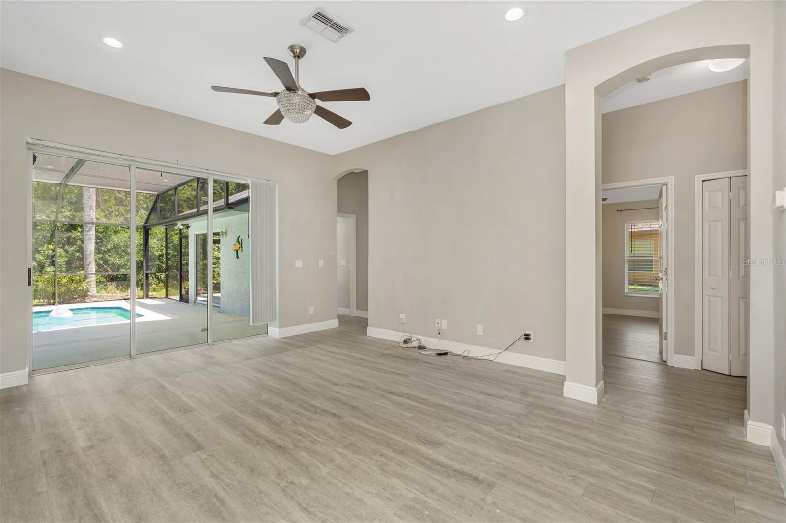 Main Family Room - opens to the pool