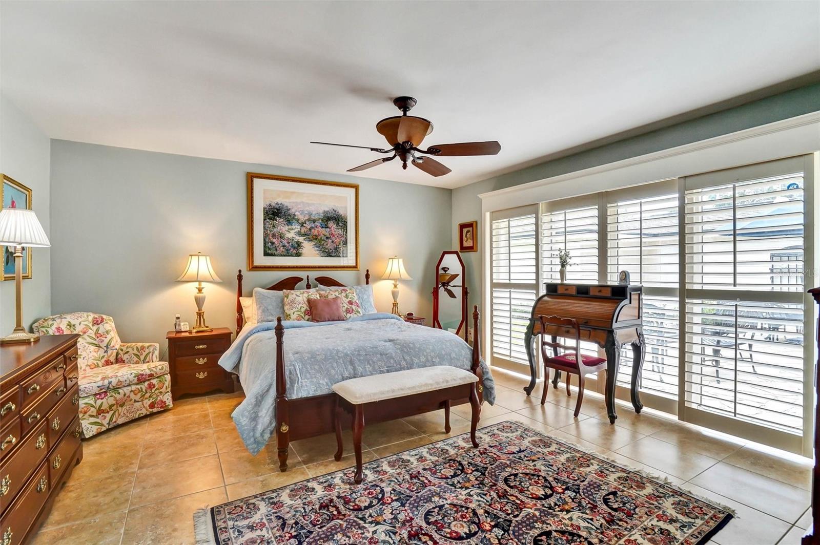 Primary suite with wide patio views.