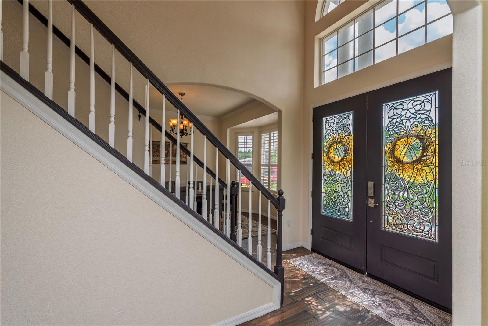 Front entrance with staricase leading upstairs.