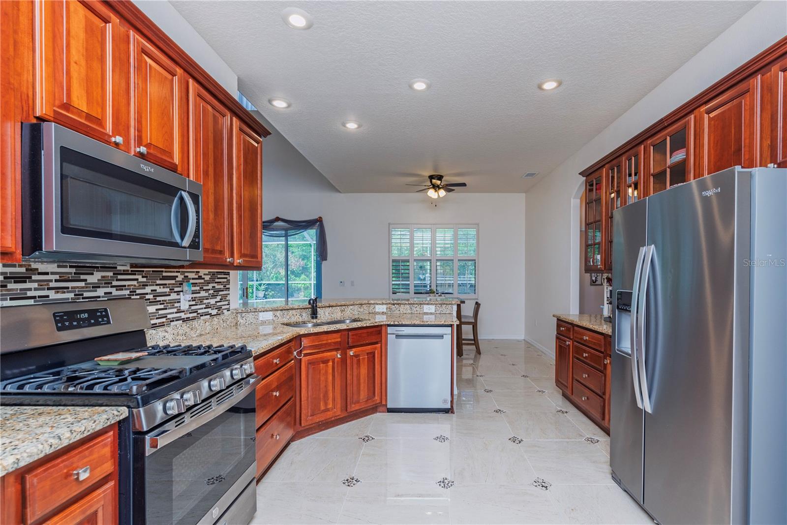 Spacious, updated kitchen featuring extensive cabinetry for ample storage and organization.