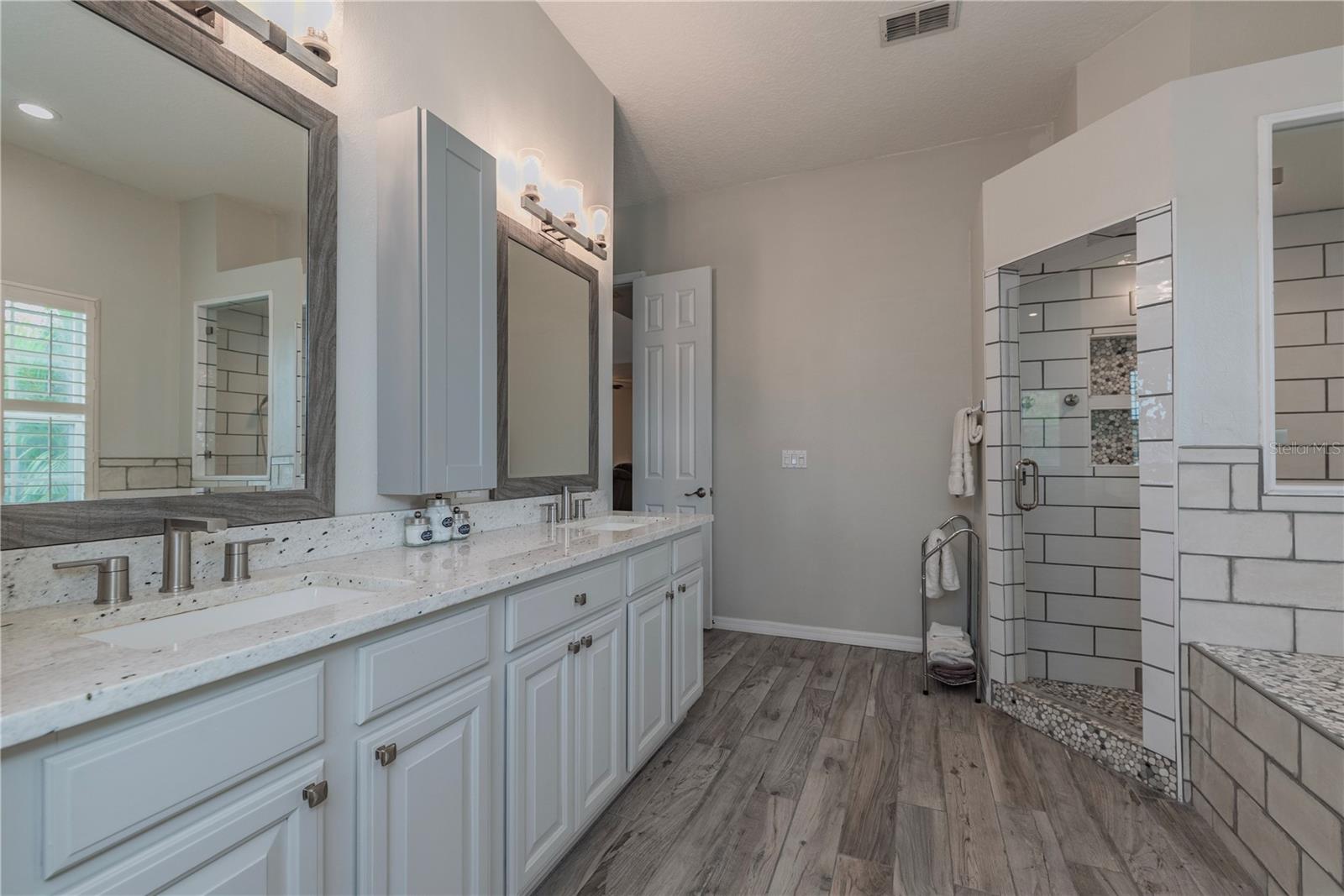 Primary bathroom with double sinks.