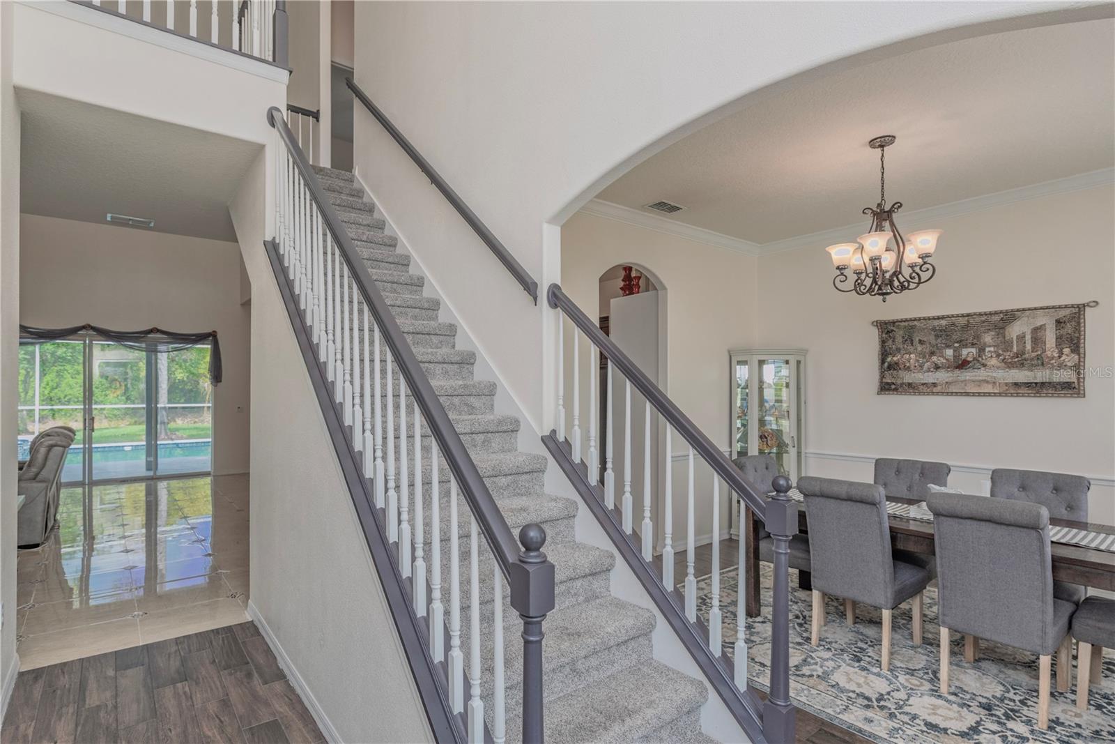 Staircase leading to upstairs.