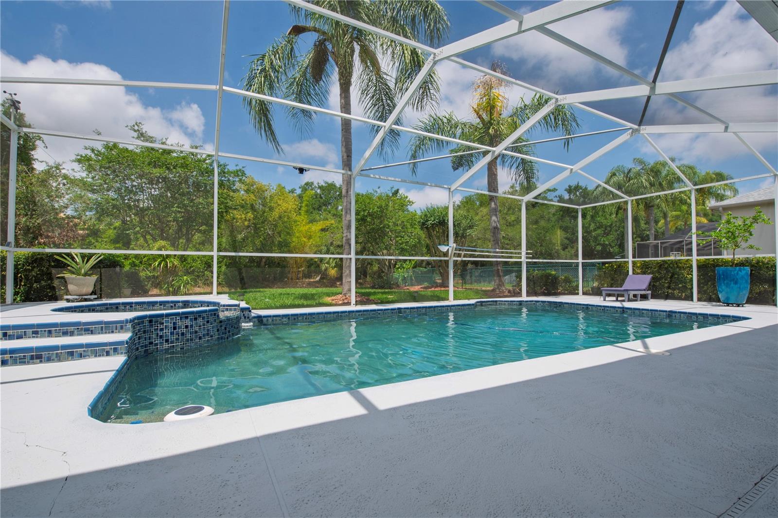 Screened pool for enjoying the hot summer days.