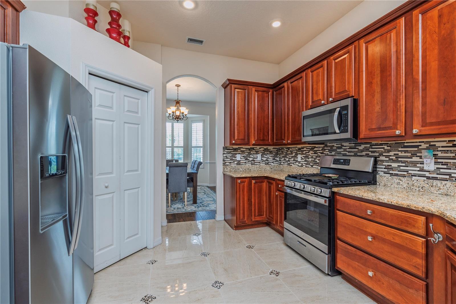Spacious, updated kitchen featuring extensive cabinetry for ample storage and organization.