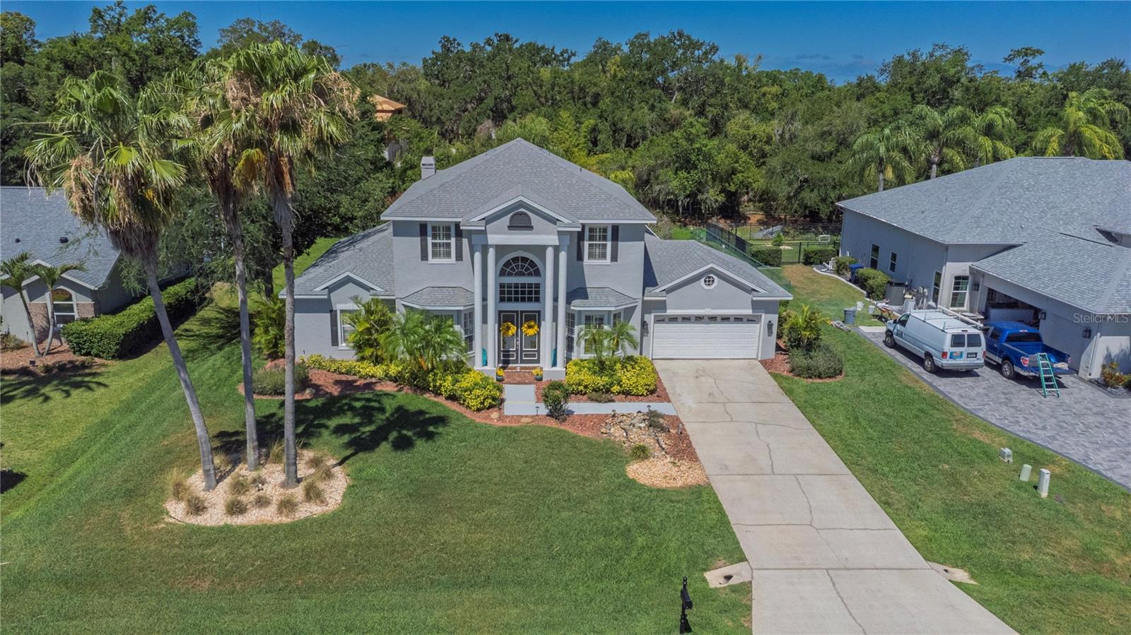 Driveway leading to 2 car garage.