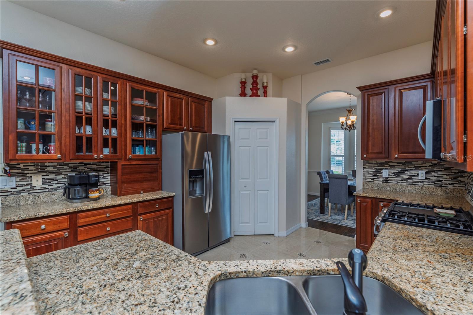 Spacious, updated kitchen featuring extensive cabinetry for ample storage and organization.