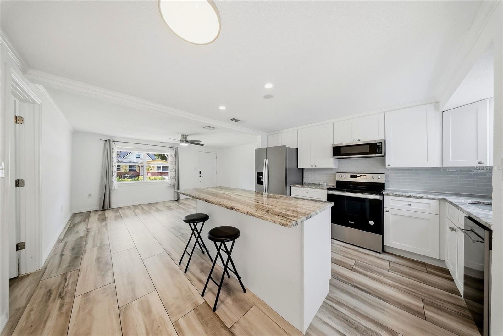 Kitchen with island, stainless steel appliances
