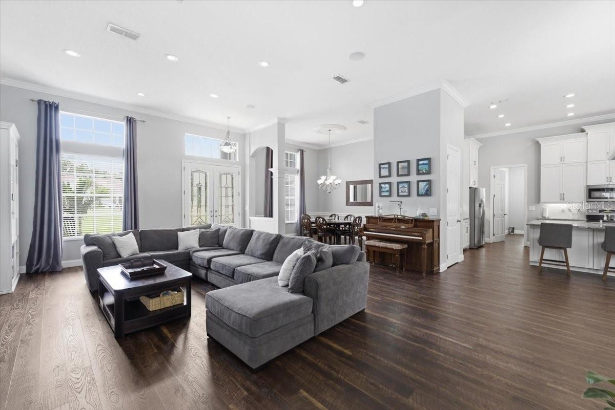 large great room with hidden shelf/door storage