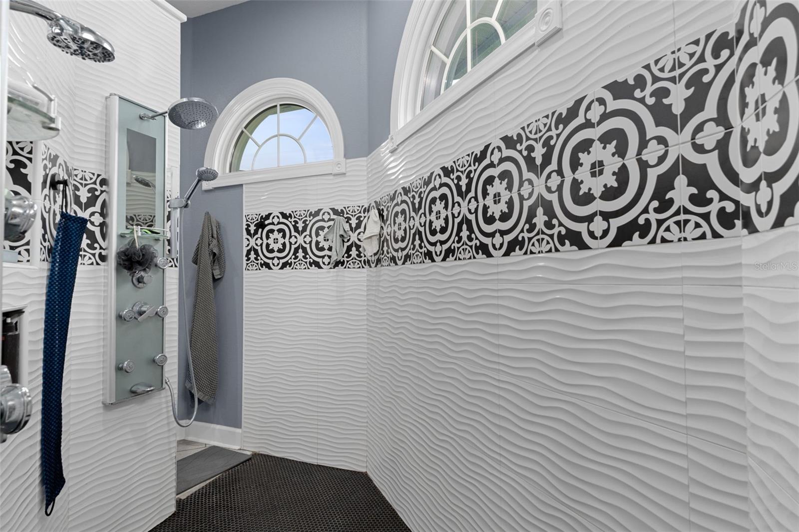 Walk through shower with double shower heads