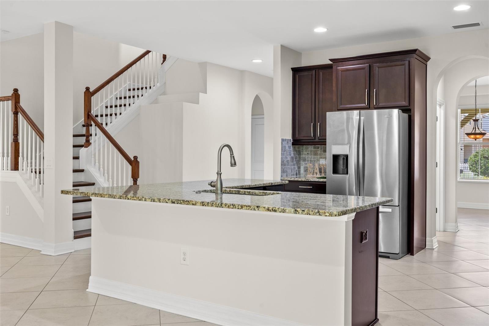 Stunning Staircase Open to Great Room