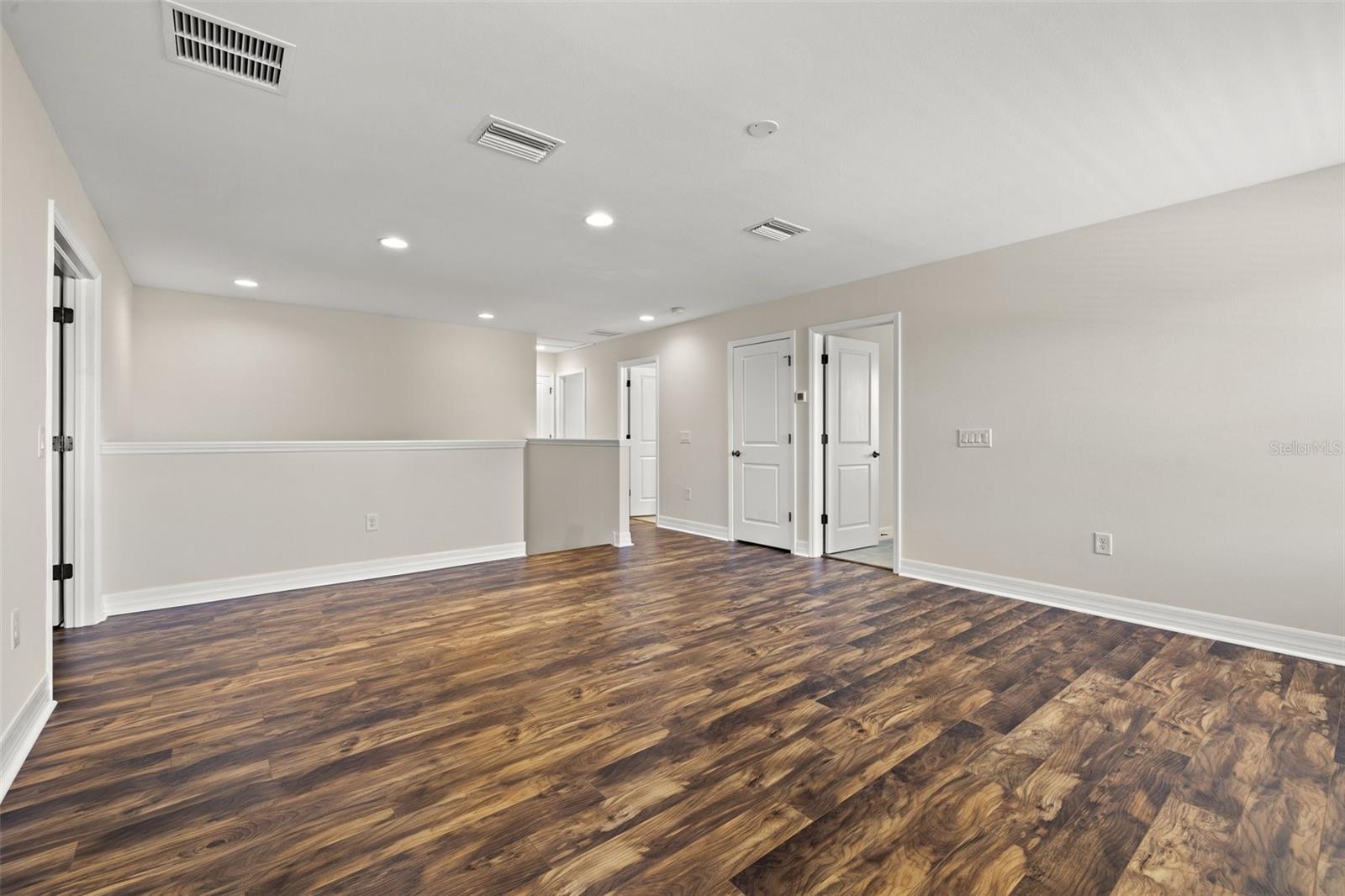 Loft Area with Bedroom Doorways