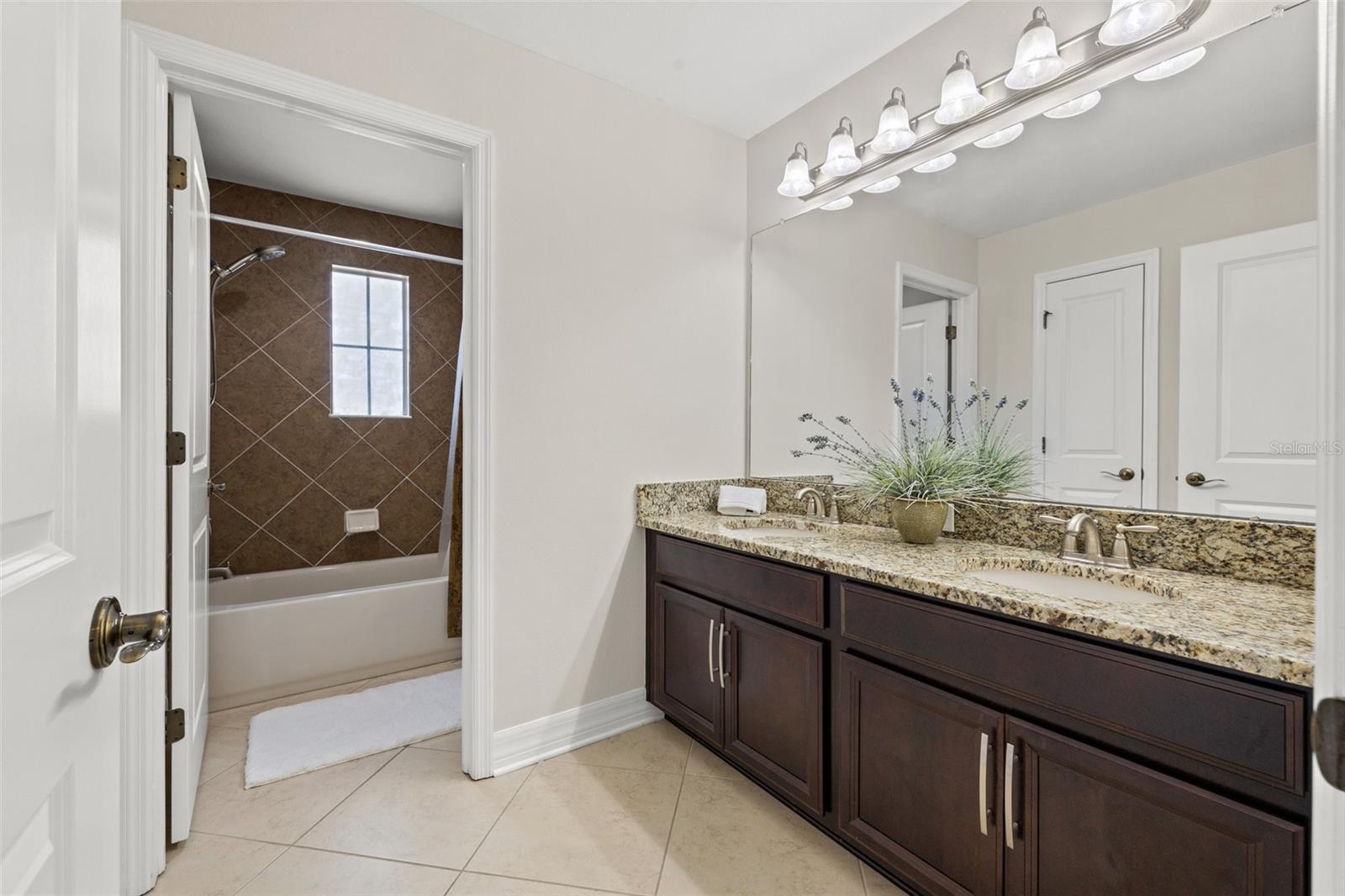 Full Bathroom with Double Sinks