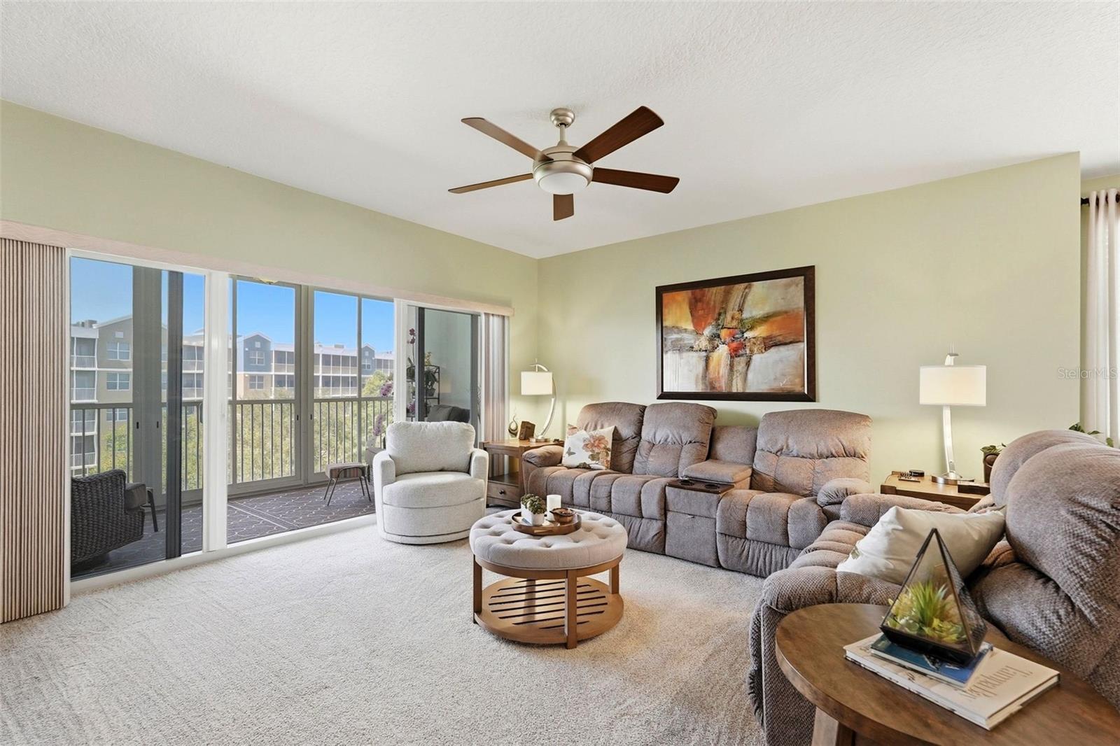 Living room opens to Enclosed Lanai