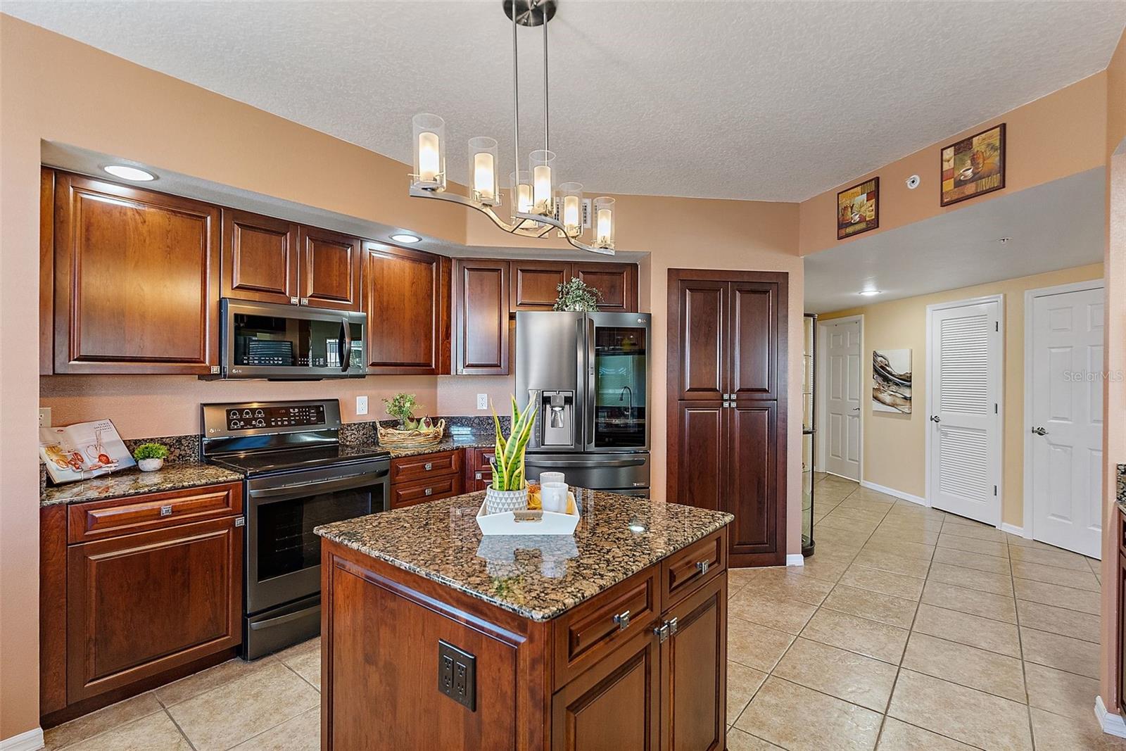 Center island w/ electrical outlets and storage