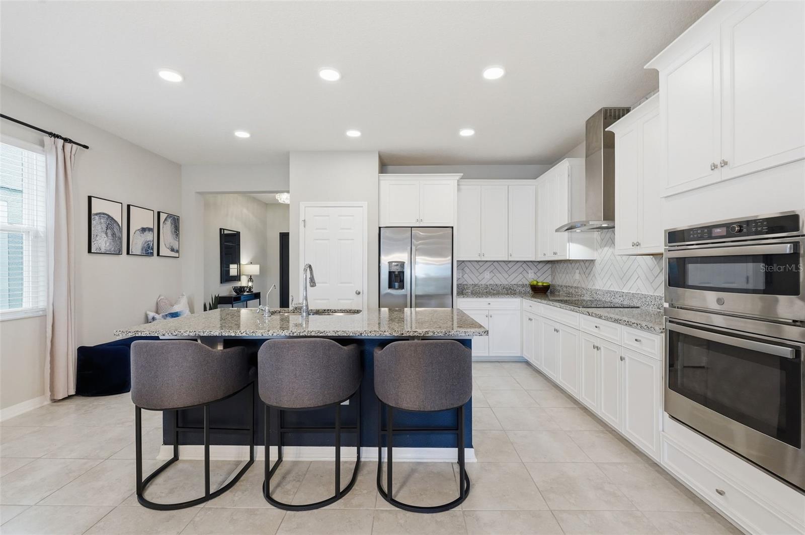 Kitchen, vent hood, built in oven and microwave