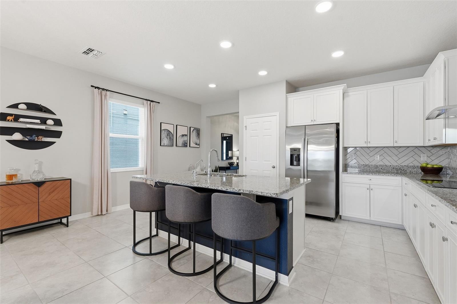 Kitchen, vent hood, built in oven and microwave
