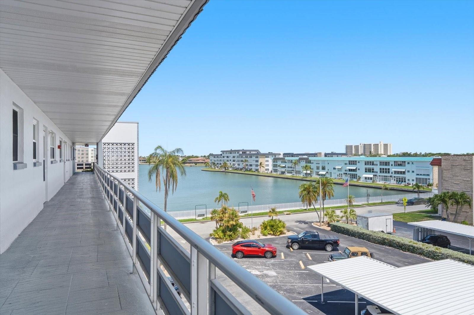 Covered, deeded parking space #30 is directly across from the entrance and elevators.