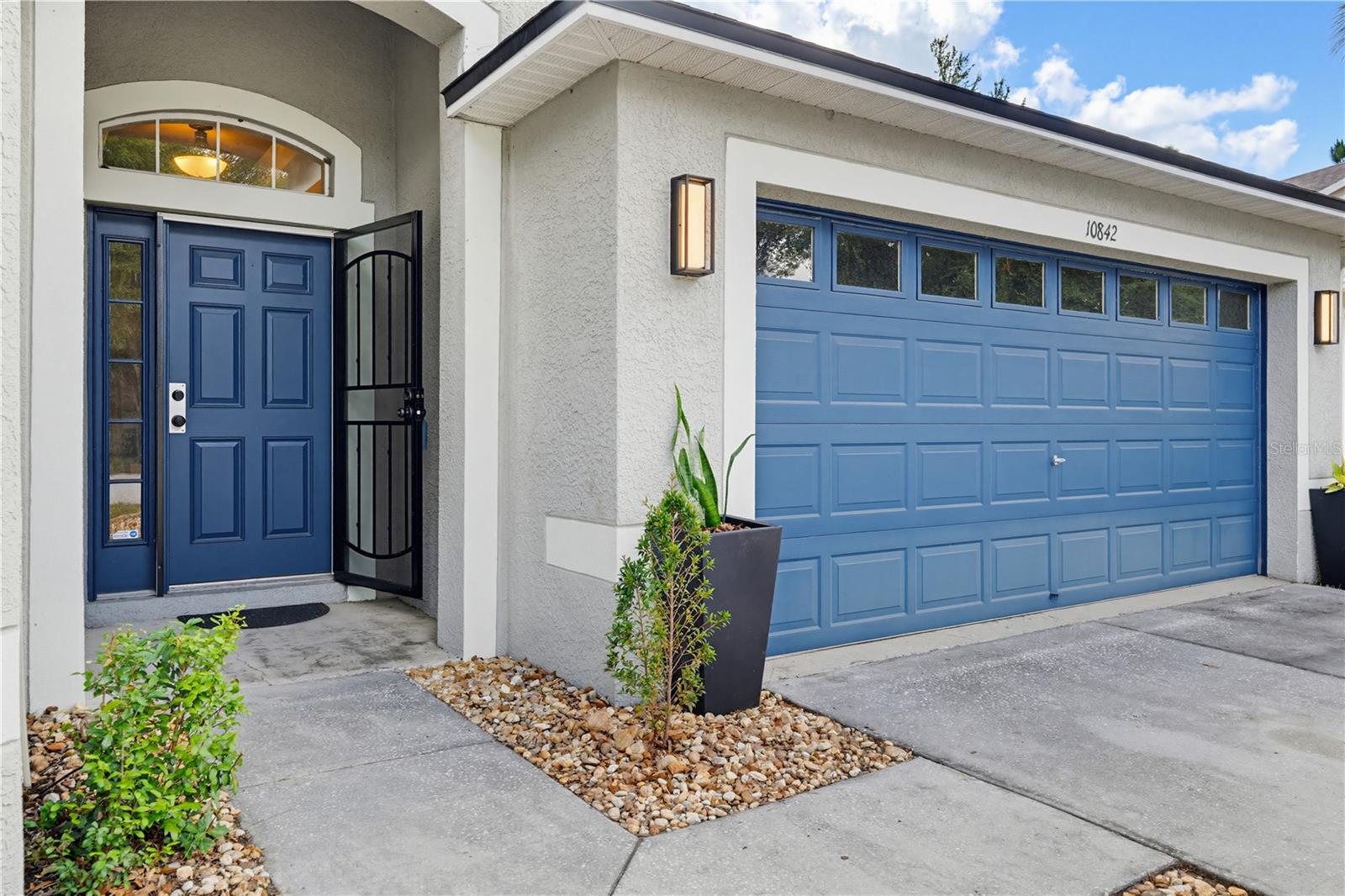 Front door with 2 car garage