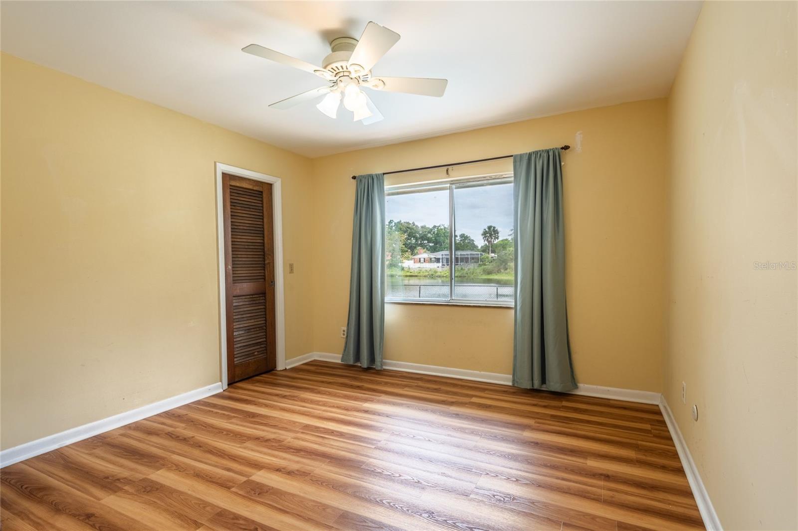 3rd bedroom with a view of the lake.