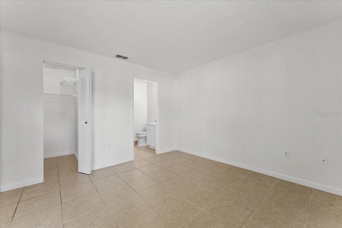 Primary with ensuite bath and walk in closet