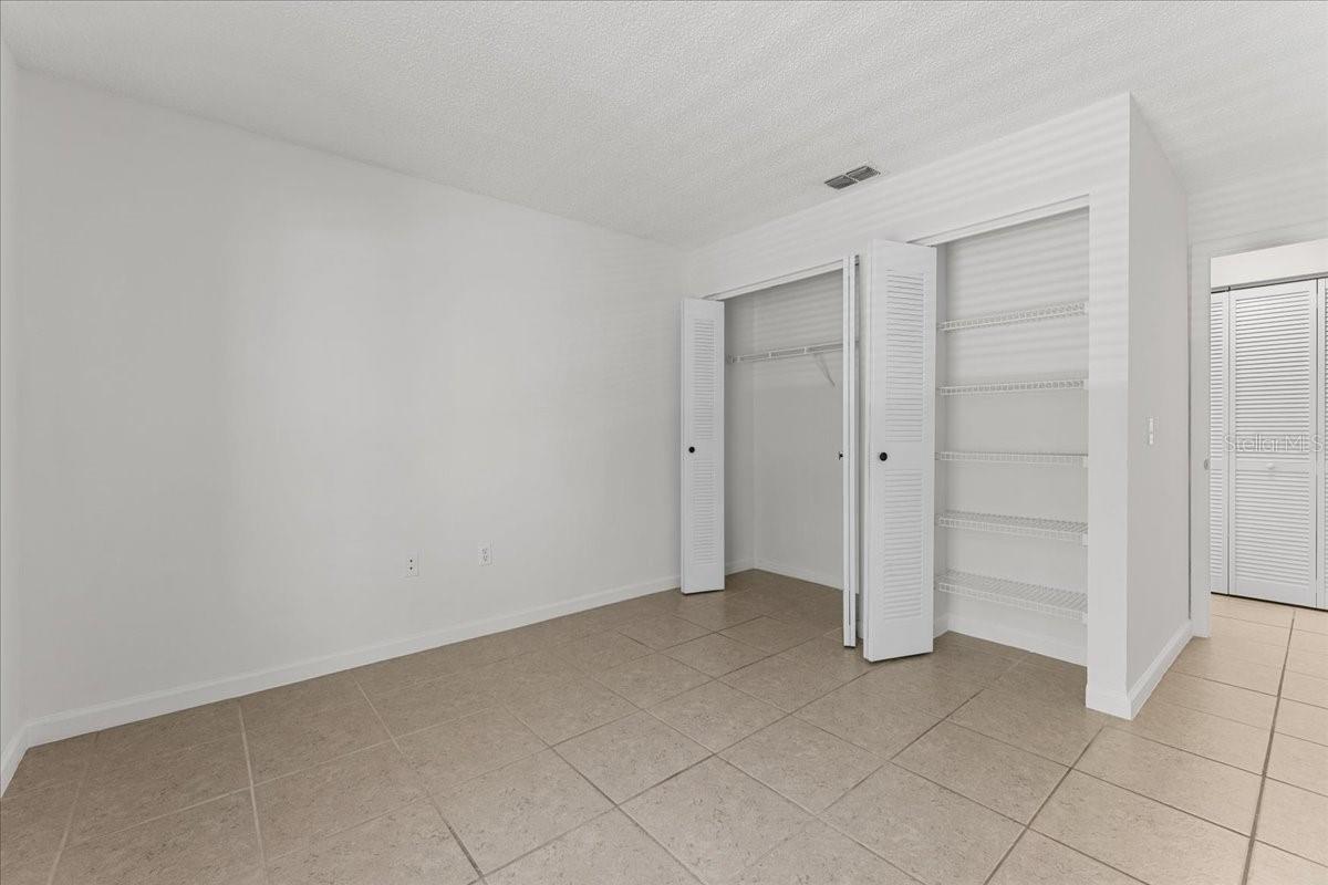 Bedroom 2 with dual closets