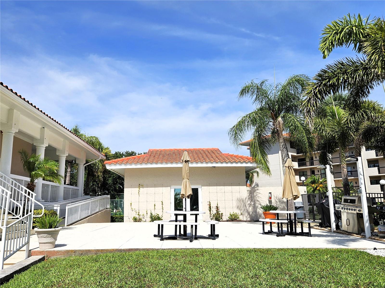 BBQ area by pool and clubhouse