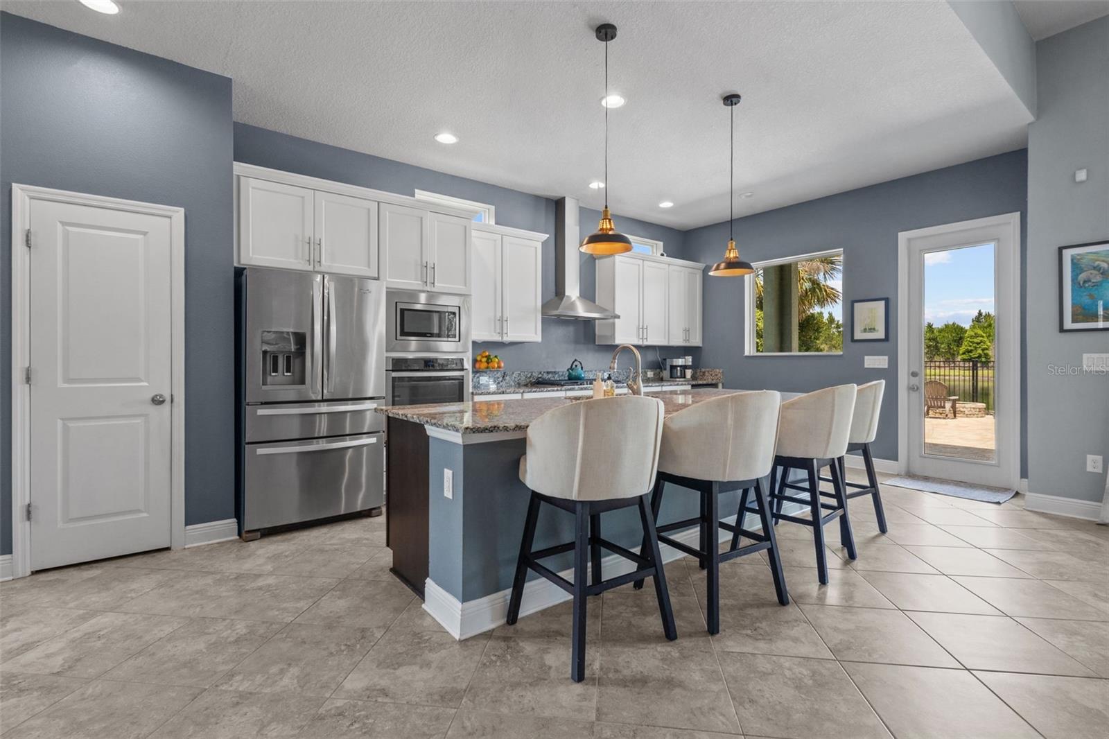 Beautiful kitchen designed around storage, functionality, and entertaining