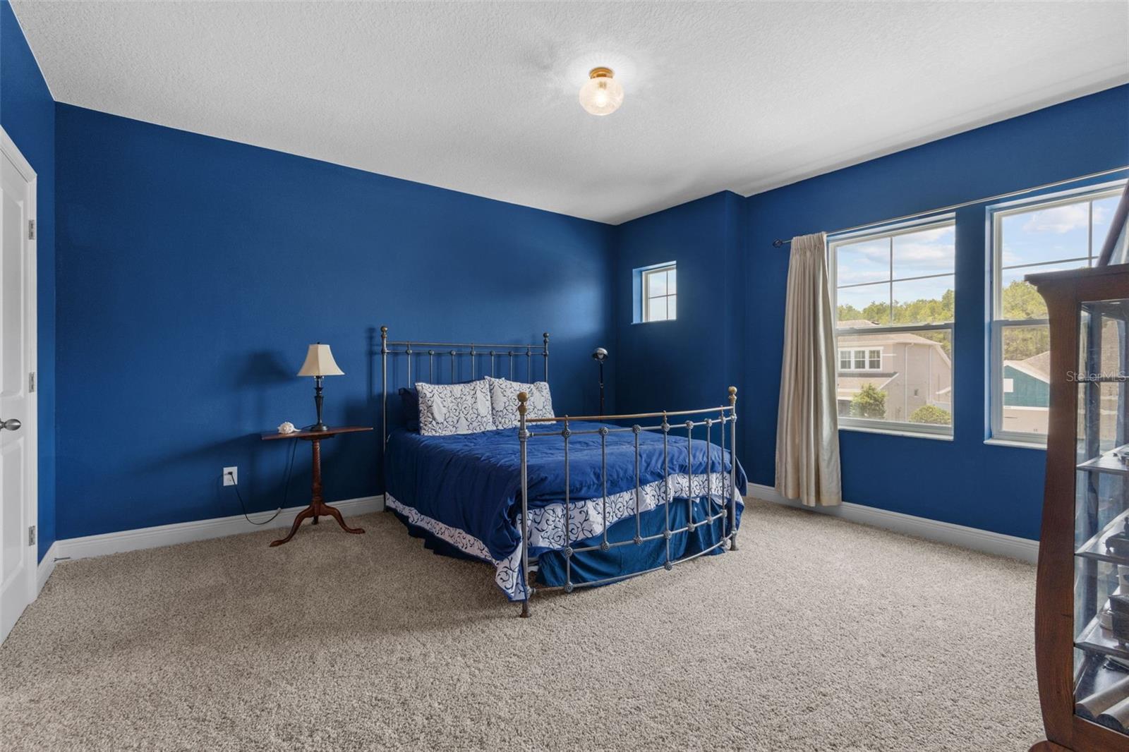 Bedroom 2 features walk in closet and en suite bathroom