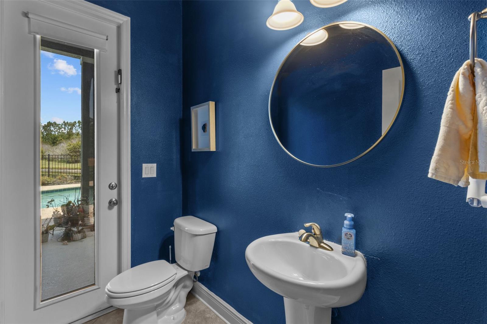 Downstairs half bath perfect ofr a pool bath
