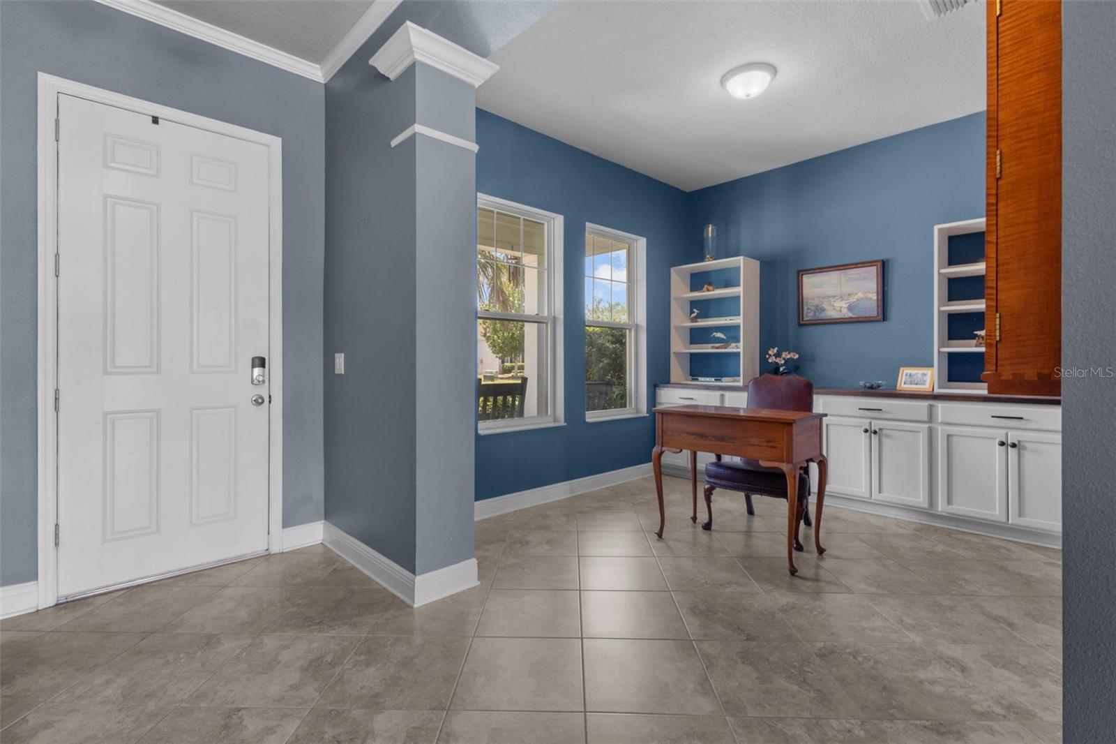 Bright foyer creates a warm first impression and connects easily to the office and main living areas
