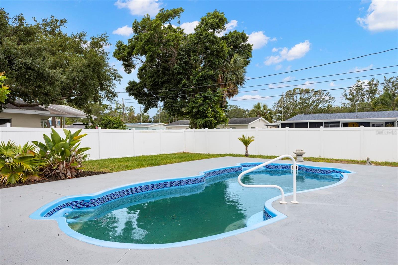 Beautiful in ground pool and terrific backyard space