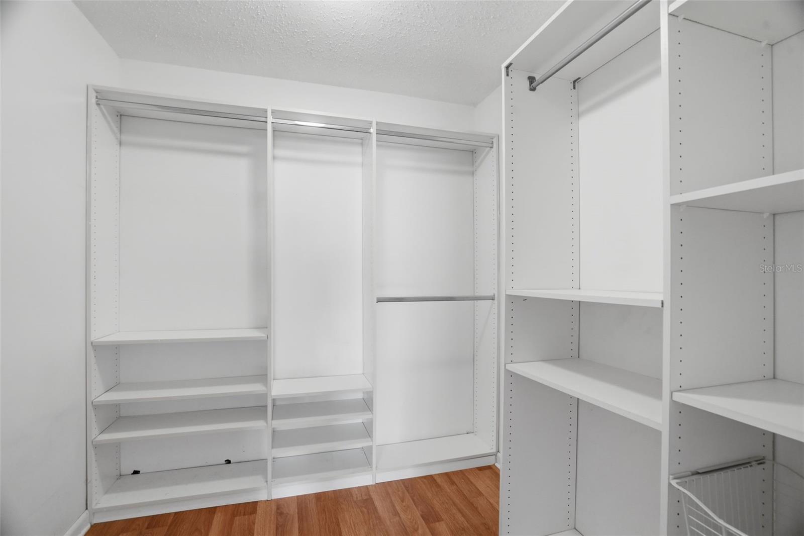 Large primary walk-in closet.