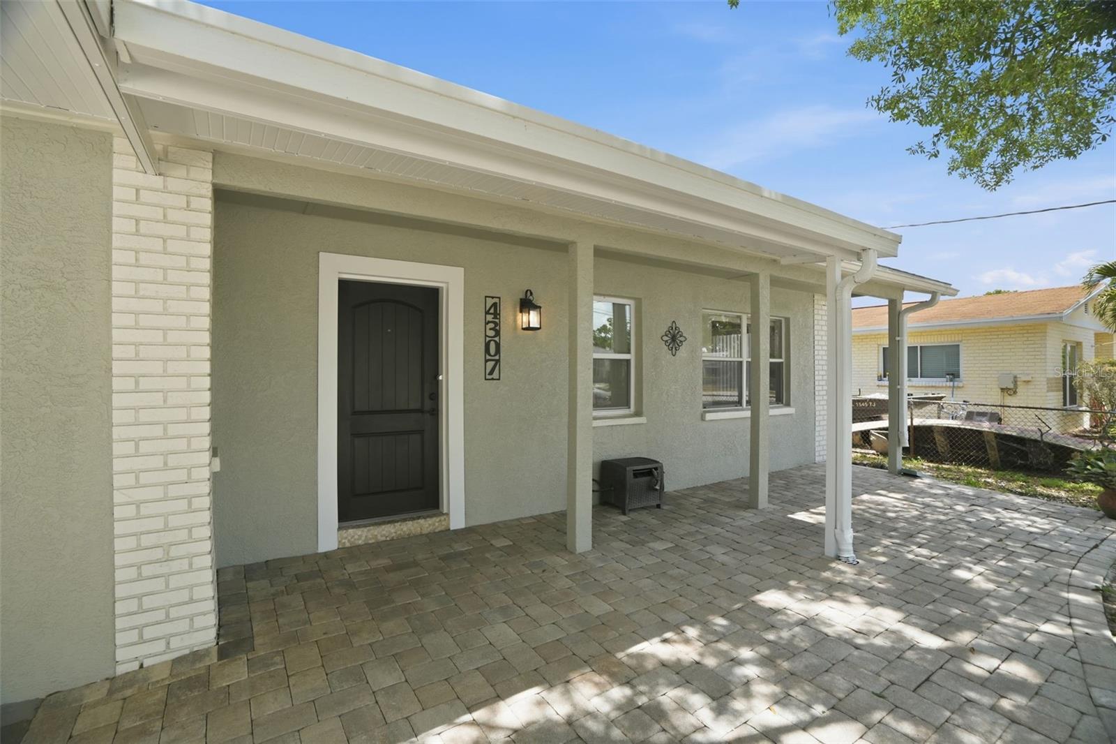 Large paver porch and walkway