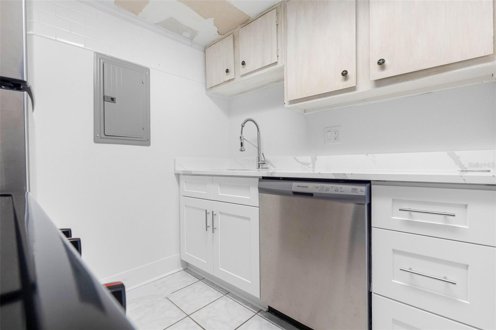 Kitchen, ceiling needs a little work.