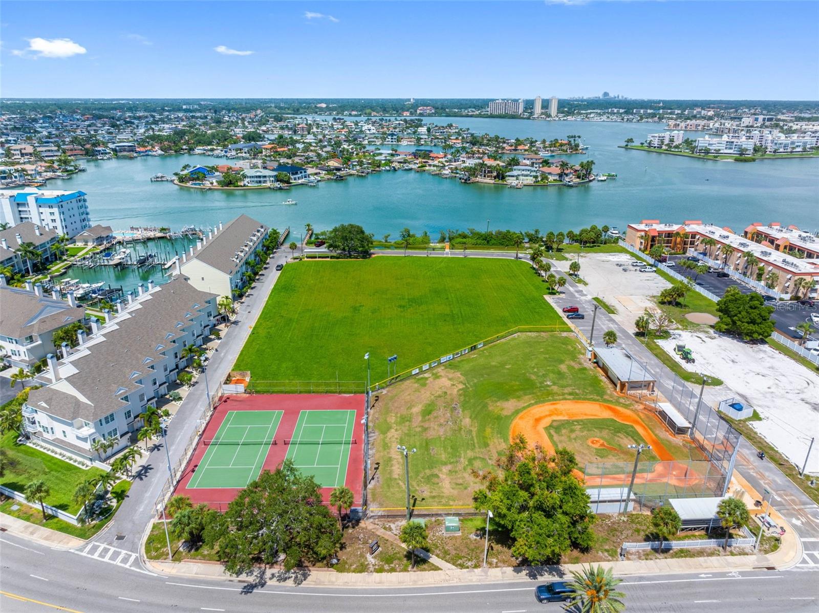 The park has several tennis courts, a baseball field and a basketball goal.